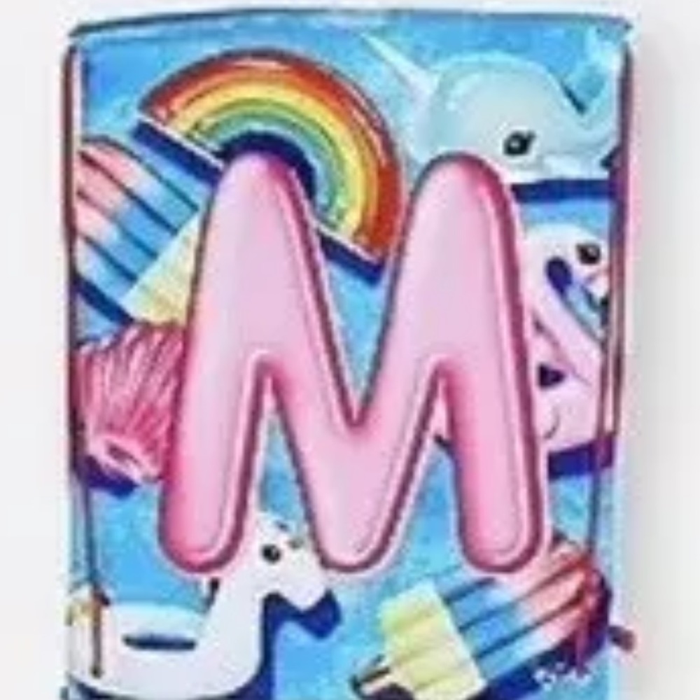 Justice M beach towel in a bag